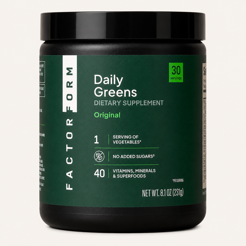 Factor Form Daily Greens jar with a scoop of bright green powder